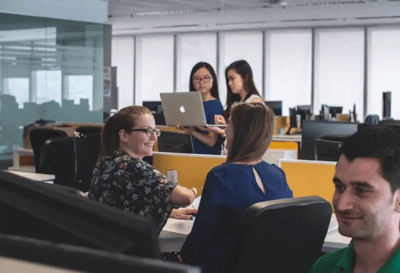 Two-People-working-on-latop-in-a-office-1